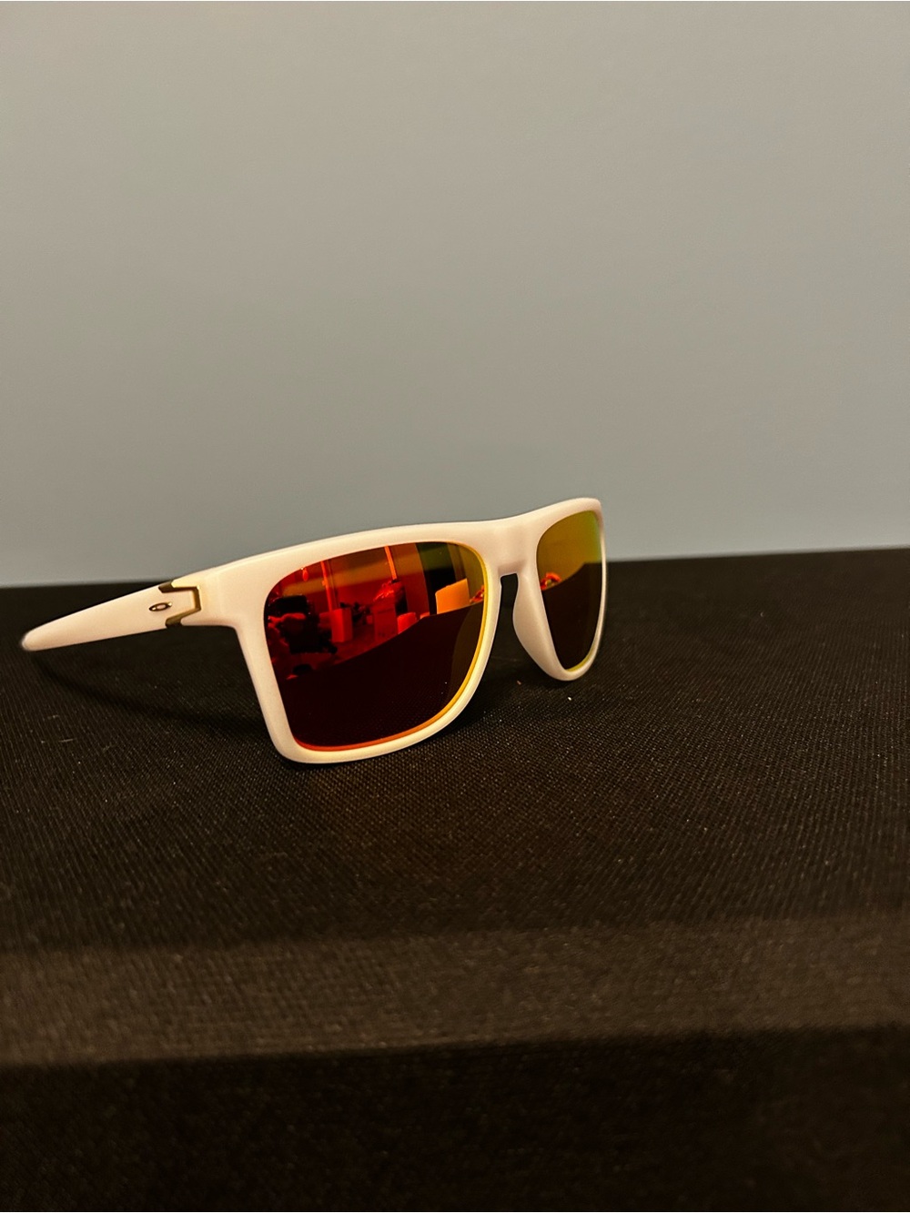 Oakley Men’s White Frame Sunglasses with Red-Orange Mirrored Lenses